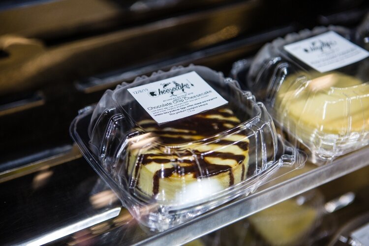 Individual slices as well as whole cheesecakes fill the shelves inside City Market.