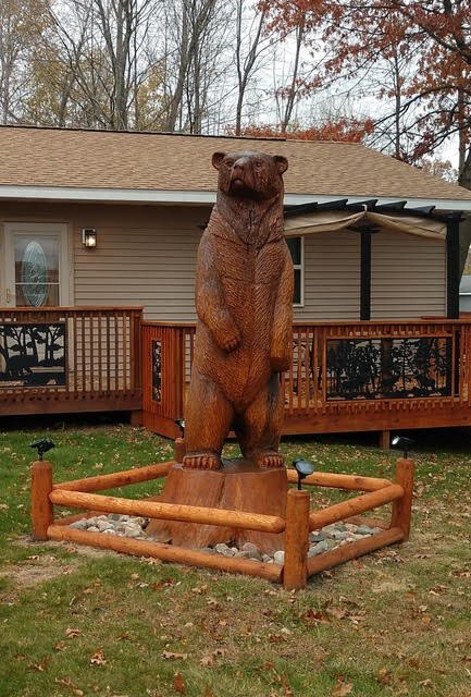 Tom Gillman wields a chainsaw to create art in the former of carvings. He’s even been asked to transform old stumps into life-size carvings of animals.