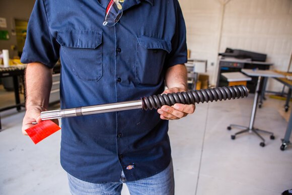 While bidding on jobs, Davis and O'Brien found a piece of Saginaw Valley history. Printing on this ball screw assembly – which was used on the Ohio Class Submarine 50 years ago – was manufactured at Saginaw Steering Gear.