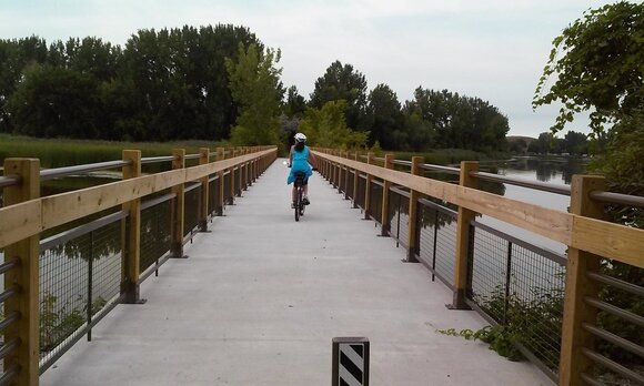 Bikers, in-line skaters, and walkers all use the trails that run near the Saginaw River in Bay and Saginaw counties. Michigan Natural Resources Trust Fund dollars helped pay for the trails. (Photo Credit: Cathy Washabaugh)
