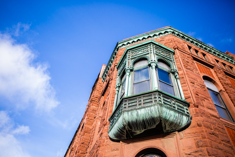 In May of 1903, the newly completed Temple was destroyed by fire. All that remained of the building were the vertical walls; the entire roof, including a 114 foot-high tower and three Moorish Domes, was completely destroyed. The Masonic fraternity immediately set out to rebuild the building, and the restoration of the Temple was completed in 1905.