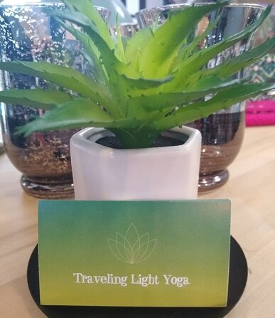 Jodee Mitrzyk, who has practiced yoga for nearly 27 years, opened Traveling Light Yoga in the old Goddeyne Building one year ago.