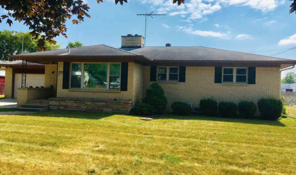 This ranch sits on a double lot and is walking distance from Bay City's popular Krzysiak’s House.