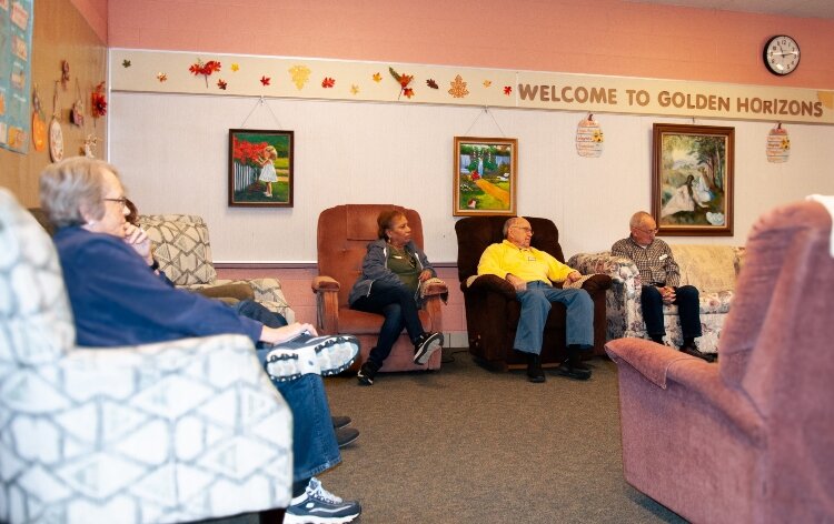 Members gather inside the Marsac Street building for activities and games during the day.