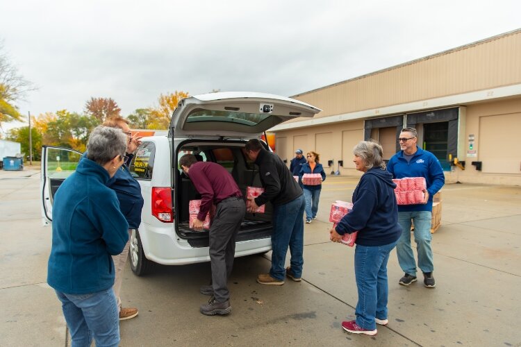 During United Way Sugar Distribution Day, Michigan Sugar gave away 43,000 pounds of sugar. Agencies received 2-pound bags as well as individual serving bags.