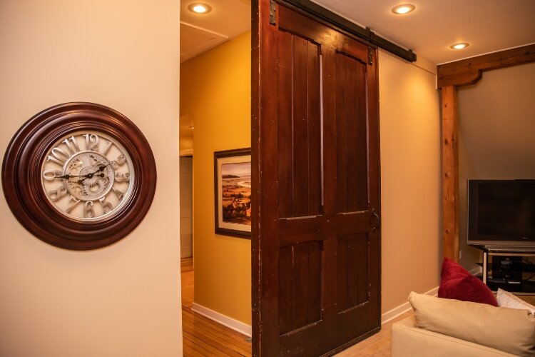 Sliding barn doors preserve the original character of the home, which was built in 1908.