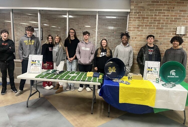 Voices of Youth correspondent Elyse Hompstead surveyed students about which university they would rather attend. The University of Michigan won a decisive victory in the poll.