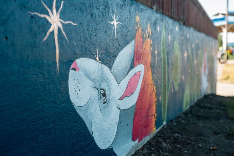 Some of the Wenonah Park murals, coordinated by Studio 23, are fanciful, such as Flight of the Rabbits created by Jordan Taylor.