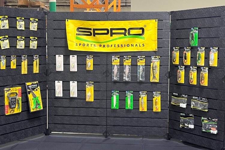 During the conference, anglers and reporters browsed fishing gear.