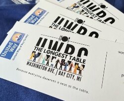Diners of all backgrounds will join together for a meal during the United Way of Bay County's Longest Table event in September. The 2025 event takes place in Uptown Bay City. (Photo courtesy of the United Way of Bay County)