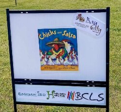 Families can enjoy a walk through a city park while reading a fun story with StoryWalks. A coalition of agencies are working together to bring fun, educational programs to Bay City parks this summer. (Photo courtesy of Bay County Library System)