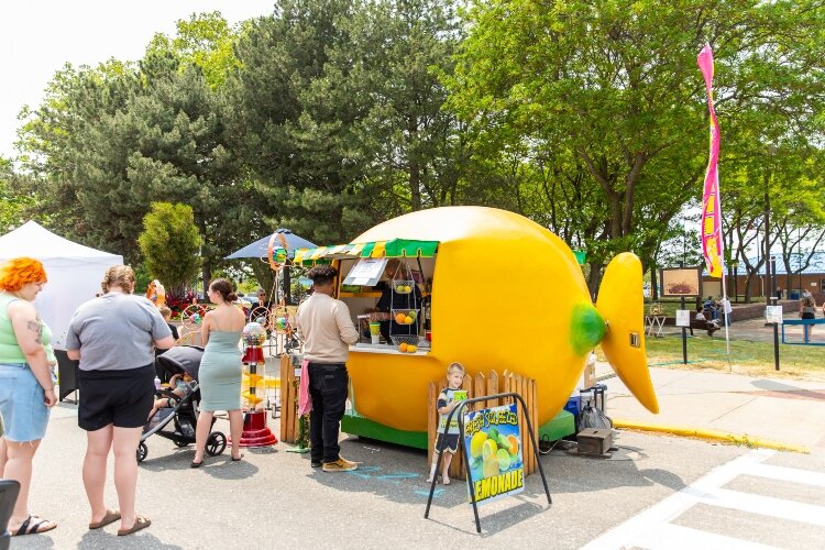 Sunny skies on the first day of the art festival kept drink vendors busy.