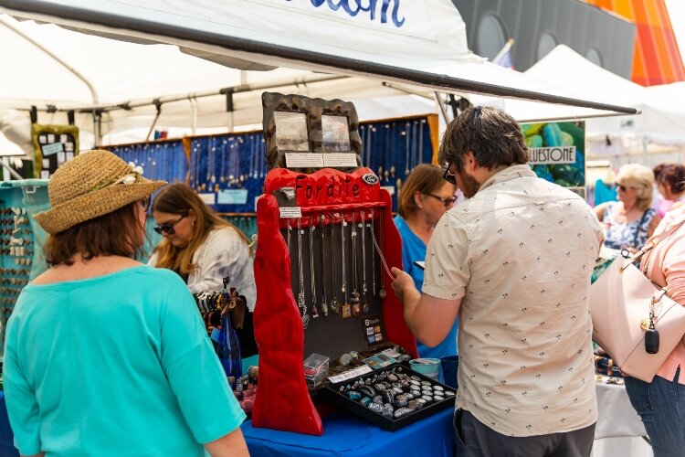Artists showed pottery, jewelry, textiles, weaving, sculptures, watercolors, woodworking, and more during the two-day street fair.