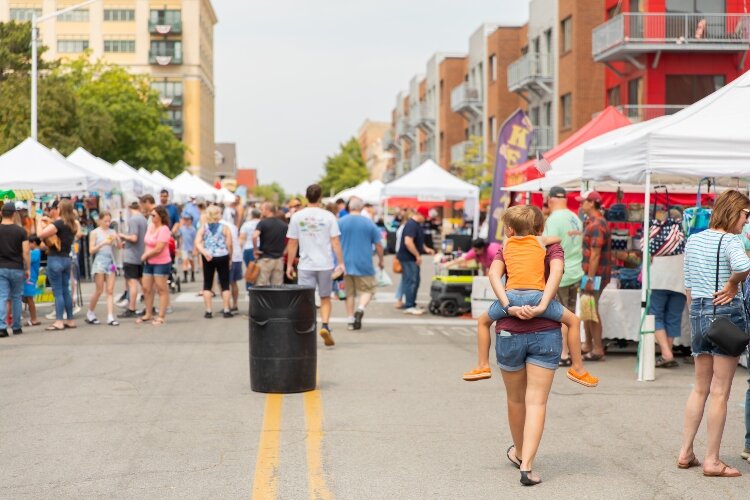 It was hard to walk through the art festival without running into someone you knew.
