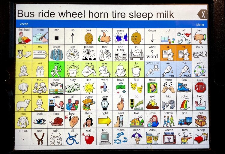 Marlia uses a LAMP board to communicate with family, friends, and child-care staff.