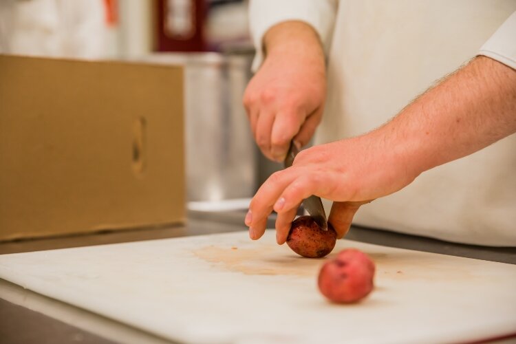 In addition to serving the public inside Blooming Chefs restaurant, the students in the Culinary Arts program also supply the student cafeteria with some items. The cafeteria work gives the students experience in a faster-paced setting.
