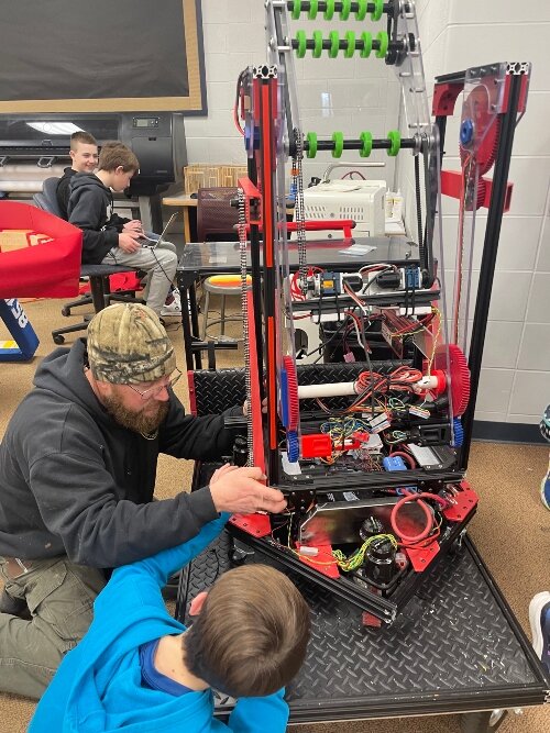 Building a robot, such as this creation by the Cramer Junior High team, gives kids practice at real-life skills.