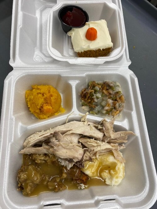 For holidays, volunteers often start prepping the meals early in the morning. Local restaurants and organizations such as Hidden Harvest often donate food for the program. (Photo courtesy of Bay City Food of Faith-West)