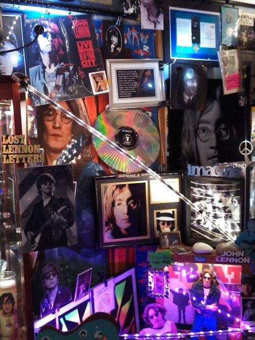 Beatles memorabilia fills the walls of the Downtown Bay City coffee shop that opened in 1993. (Photo courtesy of Beatles and Beans Coffee Emporium)