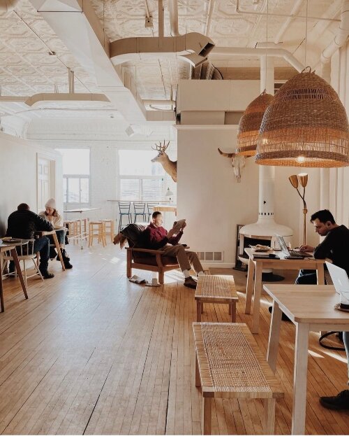 Seating inside ranges from traditional tables to lounge chairs. (Photo courtesy of Harless + Hugh Coffee)