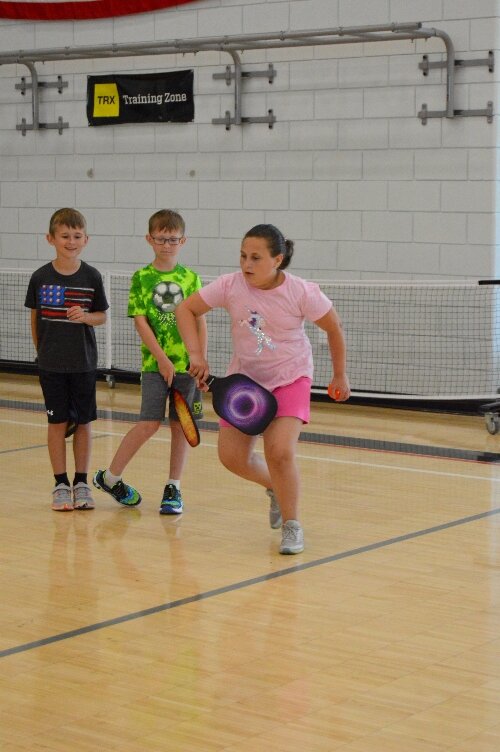 The YMCA encourages people to try new sports.
