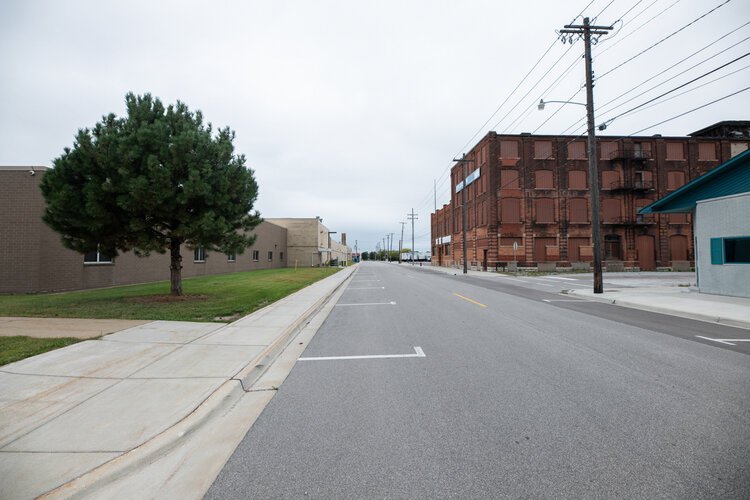 A few trees and picnic tables dot the area now, but it’s primarily used for downtown employees to park while working.