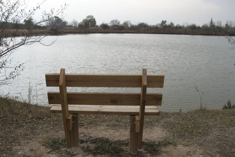 Benches along the paths winding through the park invite hikers to take a break and enjoy the sights and sounds.