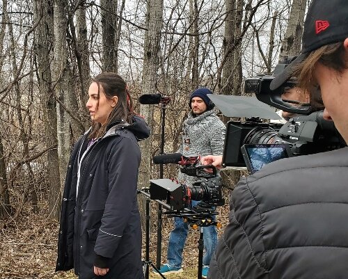 From left, Justine Brooks appears as Rebecca Redding; Josh Sobeck is on sound, Gradowski is director, and Zach Hamila is the camera operator.