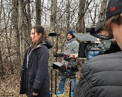 The family-friendly movie, 'Project Red,' tells an updated story of Little Red Riding Hood. It features, actors Jacob Lousbury as Liam and Justine Brooks as Rebecca Redding. Zach Hamilla is on the far right and Josh Sobeck (sound) at left.