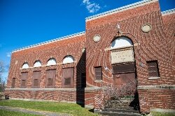From left, Trevor Keyes of Bay Future, Glenn Rowley of Bangor Township, and Steven Black of RiversEdge, answer questions about the building's history and potential in the future.