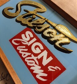 Justin Stilson's hand painted this safe from the 1870s, restoring its beauty.