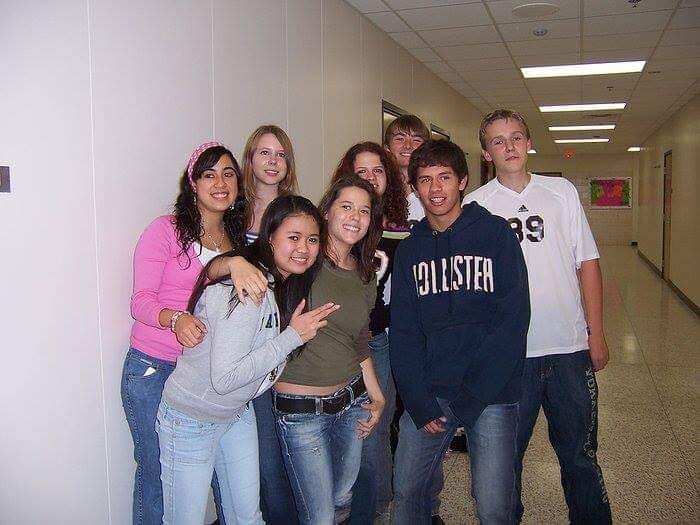 Luba Pavlovska, center in the green shirt, poses with other exchange students at Bay City Western High School during the 2007-08 academic year.