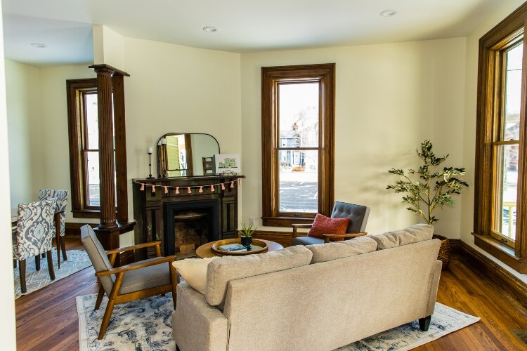 Three original fireplaces are being kept, which the family says adds a classic touch to the home. (Photo by Ashley Brown) 