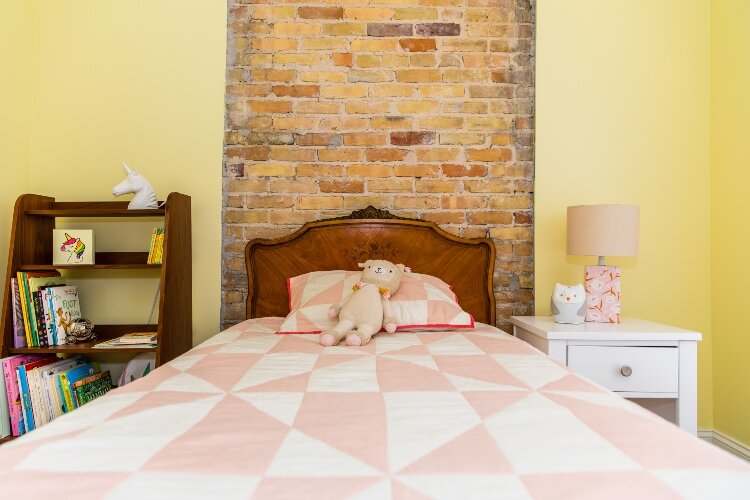 Wayne and Cadia Hofmann prioritized finishing the interior of the home so they could move their family here and stop commuting from St. Charles for school and work. (Photo by Ashley Brown)