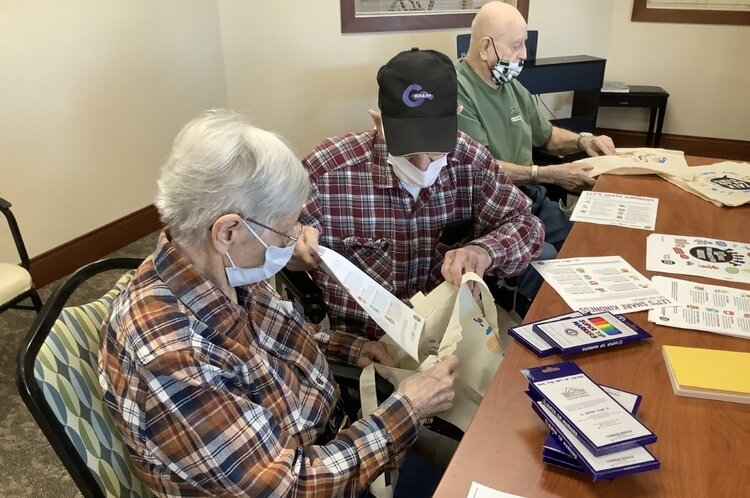 The seniors building the bags created an assembly line to create more than 200 bags in a short time.