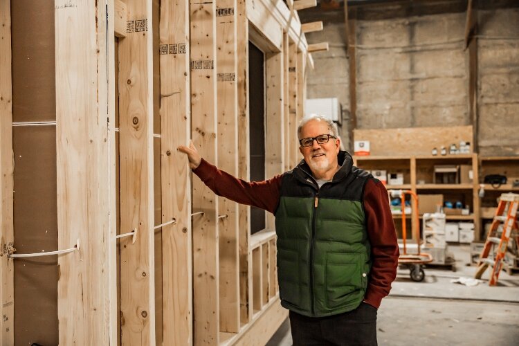 General Housing Corp. Vice President Kevin Light invites buyers to visit the factory and tour model homes.