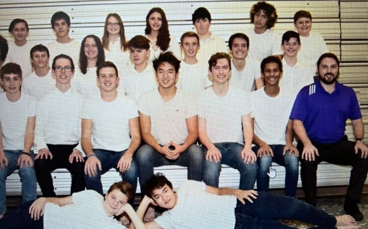 Twin brothers say their time on the swim team has taught them valuable life lessons, such as how to juggle and prioritize multiple commitments.