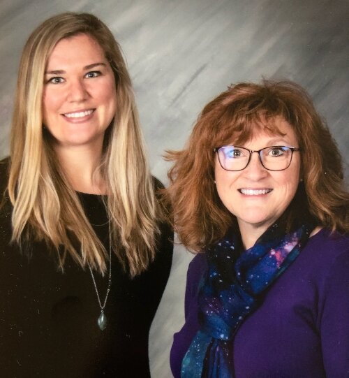 Elizabeth WIse, at left, and Lisa Forrest were honored for their efforts to teach students at the Bay-Arenac Career Center.