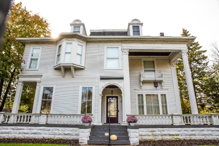 - Robert Bousfield moved to Bay City 1880s after buying a company here. He bought land from a lumberman and, in 1896, built this Queen Anne-style home.