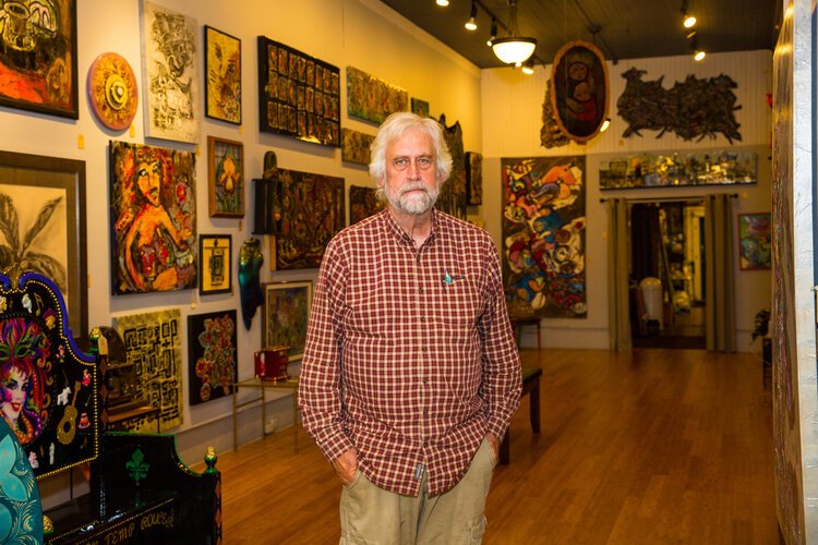 Tom Larson runs a salvage store and art gallery in Downtown Bay City.