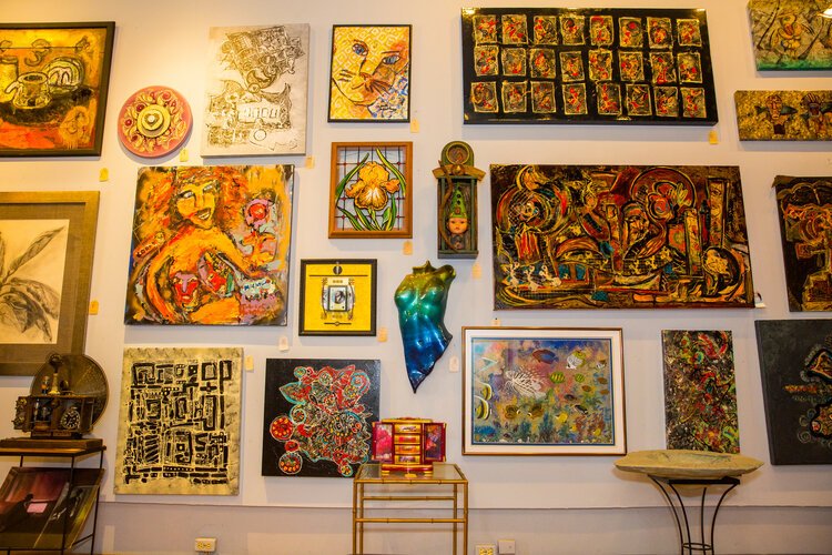 The gallery’s name (C.A.T. Work Art Gallery)) is an acronym of Tom Larson’s children, Carl, Amelia, plus his own first initial.