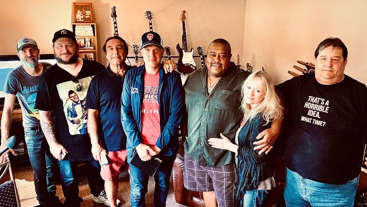 From left, videographer Robin Davey, Producer Josh Smith, Songwriter Jimmy J., guitarist Joe Bonamassa, guitarist Larry McCray, McCray's girlfriend Peggy Smith, and manager Jeff Wever met in McCray's Hampton Township home.