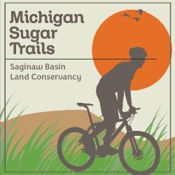 Volunteers worked this spring and summer to clear brush and make improvements to  re-open two different walking and biking loops of the Michigan Sugar Trails on the Middlegrounds Island.
