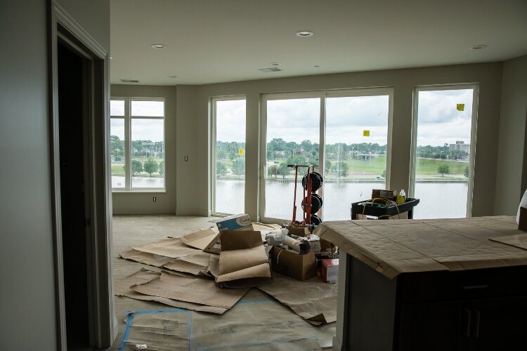 Large windows give occupants a view of the Saginaw River.