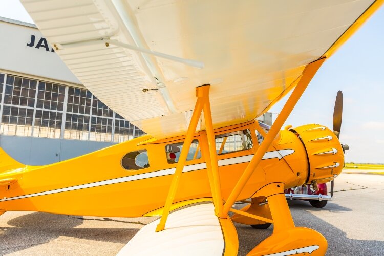 The plane is a distinct yellow now, but Staudacher believes it was originally dark blue.
