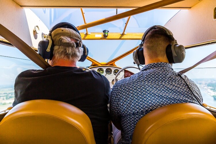 The plane is belted for four people.