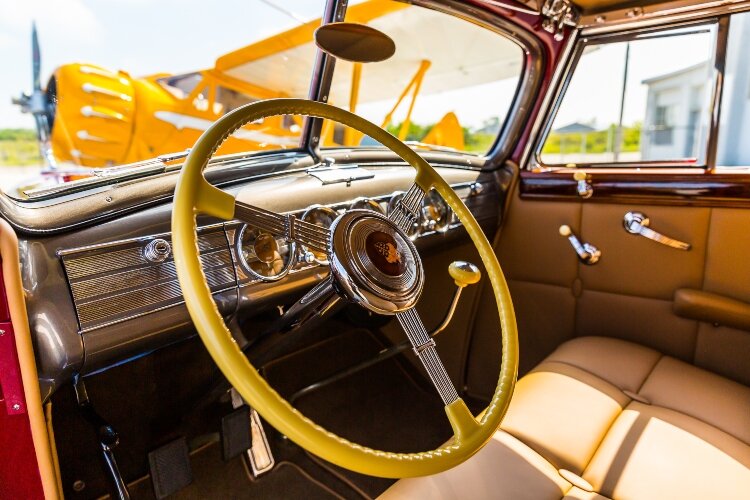 The interior was upholstered by Mark Larder of Homer, Michigan and features European rawhide.