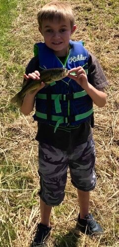 The camp covers more than 67 acres and includes a fishing pond.