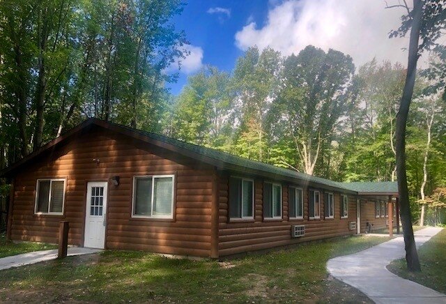 The campground includes three cabins as well as a main lodge. Inside the main lodge are a recreation room, craft room, and mess hall.