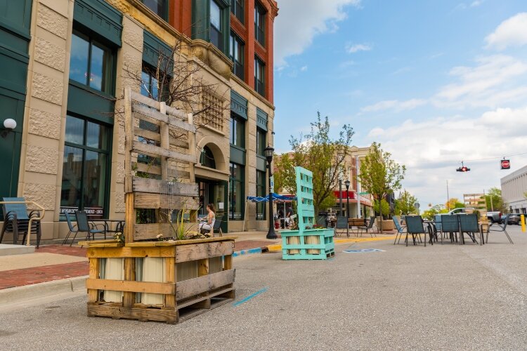 Selfie stations line the street near MI Table.